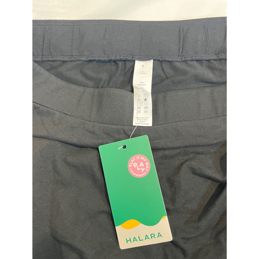 HALARA Black Ruched Front Pullon Midi Skirt Sz L Viscose Elastane Slit
Side NWT - Picture 4 of 7